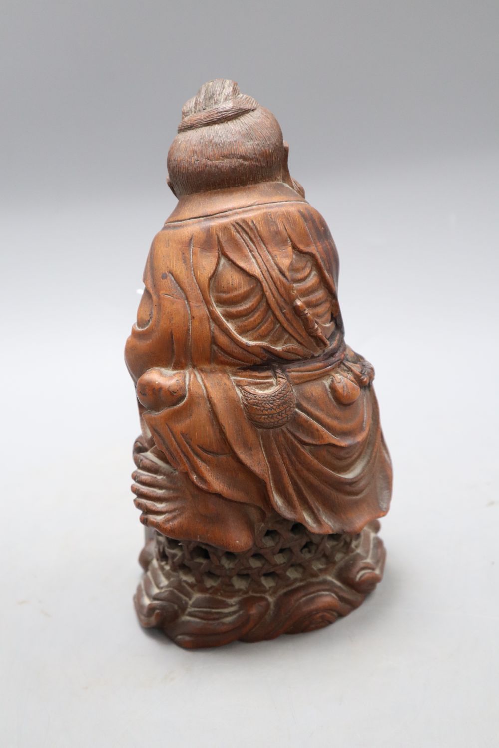 A Chinese bamboo figure of a fisherman, late 19th/early 20th century, H. 23.5cm